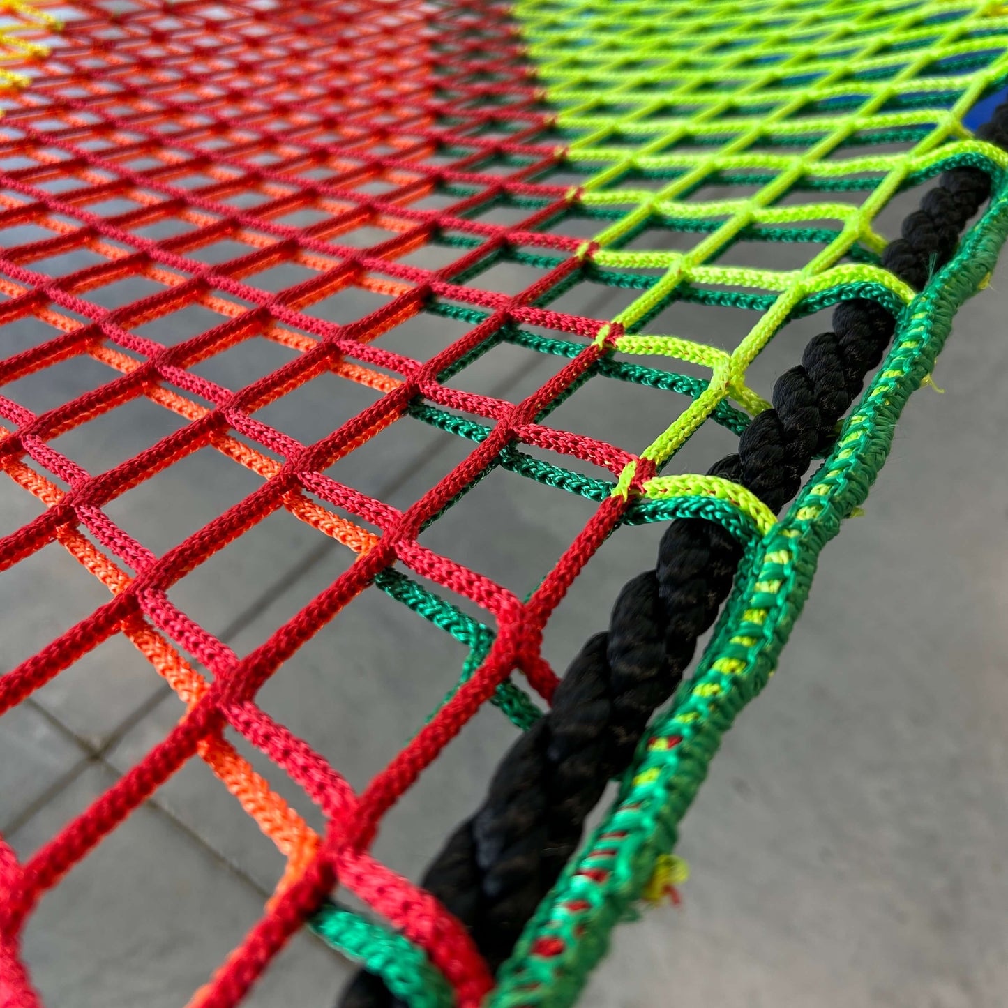 Nylon rope webbing on a cargo net hammock